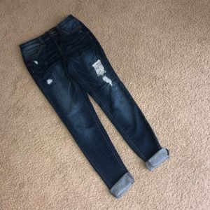 Blue jeans with ripped patches